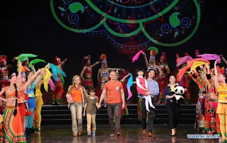 Artists perform during the opening ceremony of the "Tourism Year of China" in Moscow, March 22, 2013. The "China-Russia Tourism Year" program, which began last year with the "Tourism Year of Russia" in China, aims to foster tourism ties and humanistic exchanges between the two countries. (Xinhua/Jiang Kehong)