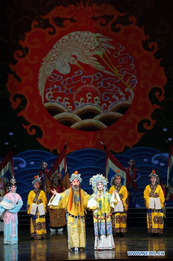 Artists perform during the opening ceremony of the "Tourism Year of China" in Moscow, March 22, 2013. The "China-Russia Tourism Year" program, which began last year with the "Tourism Year of Russia" in China, aims to foster tourism ties and humanistic exchanges between the two countries. (Xinhua/Jiang Kehong)