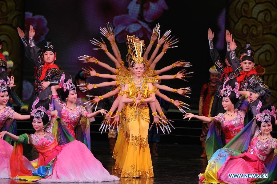 Artists perform during the opening ceremony of the "Tourism Year of China" in Moscow, March 22, 2013. The "China-Russia Tourism Year" program, which began last year with the "Tourism Year of Russia" in China, aims to foster tourism ties and humanistic exchanges between the two countries. (Xinhua/Jiang Kehong)