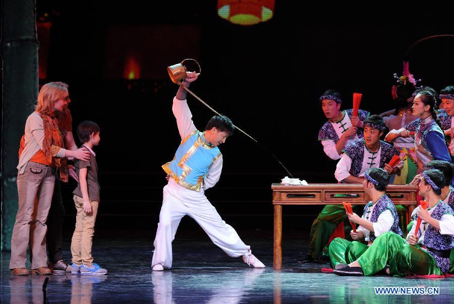 Artists perform during the opening ceremony of the "Tourism Year of China" in Moscow, March 22, 2013. The "China-Russia Tourism Year" program, which began last year with the "Tourism Year of Russia" in China, aims to foster tourism ties and humanistic exchanges between the two countries. (Xinhua/Jiang Kehong)