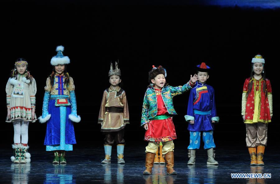 Artists perform during the opening ceremony of the "Tourism Year of China" in Moscow, March 22, 2013. The "China-Russia Tourism Year" program, which began last year with the "Tourism Year of Russia" in China, aims to foster tourism ties and humanistic exchanges between the two countries. (Xinhua/Jiang Kehong)