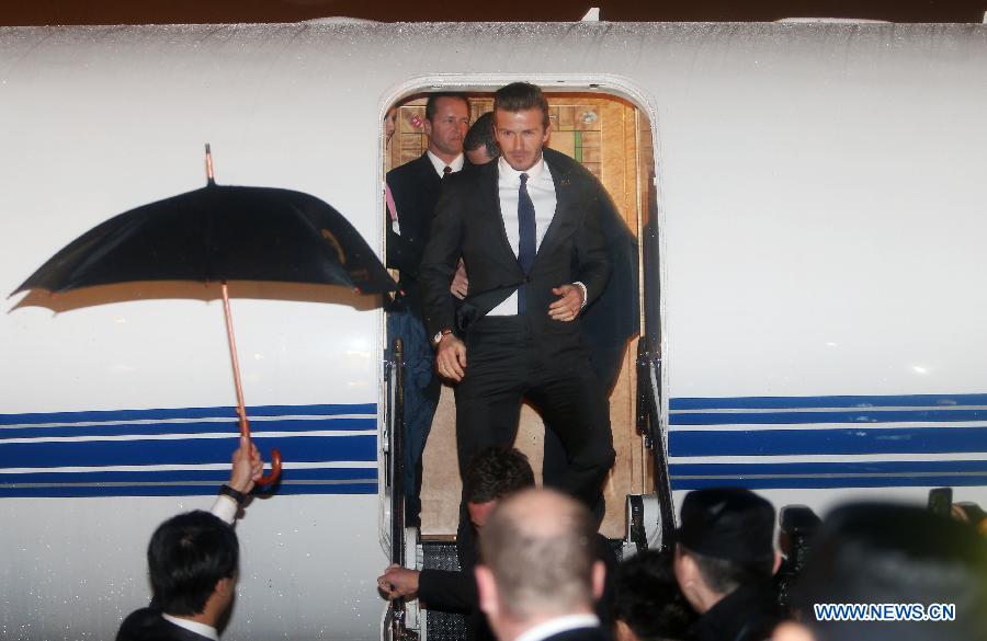 Football superstar David Beckham receives warm welcome as he arrives in Wuhan, capital of central China's Hubei Province, as the ambassador for the Chinese Super League (CSL) and the Youth Football Program, March 22, 2013. (Xinhua) 