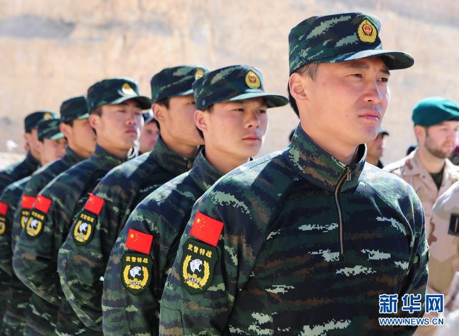 Participants attend the opening ceremony of the Fifth Warrior Competition in King Abdullah Special Operation Training Center (KASOTC) in Amman, Jordan, March 24, 2013. The competition with wide participation of 33 teams from 18 countries will be held during March 24 to March 28. (Xinhua/Cheng Chunxiang)