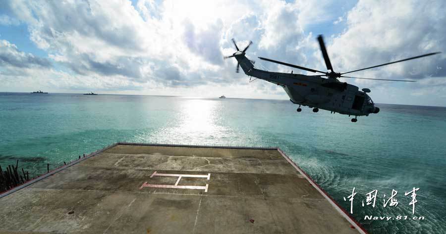 A joint maneuver taskforce under the South Sea Fleet of the Navy of the Chinese People’s Liberation Army (PLA) cruised the islands garrisoned by the troops of the South Sea Fleet in the waters of the South China Sea on March 23, 2013.(navy.81.cn/Qian Xiaohu, Song Xin)