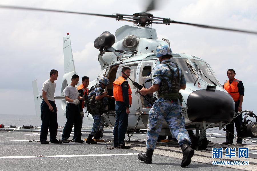 The 14th escort taskforce under the Navy of the Chinese People's Liberation Army (PLA) expels several suspected vessels. (Xinhua/Rao Rao)