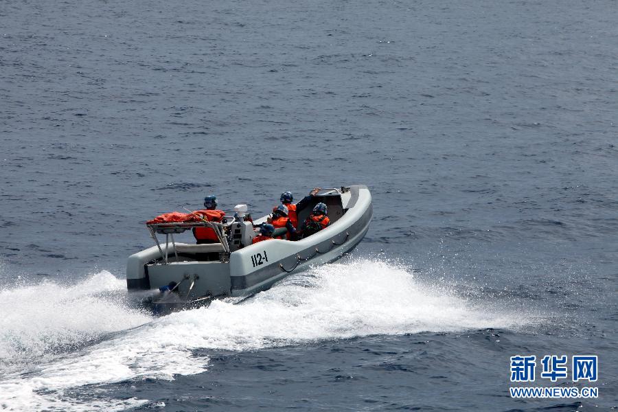 The 14th escort taskforce under the Navy of the Chinese People's Liberation Army (PLA) expels several suspected vessels. (Xinhua/Rao Rao)