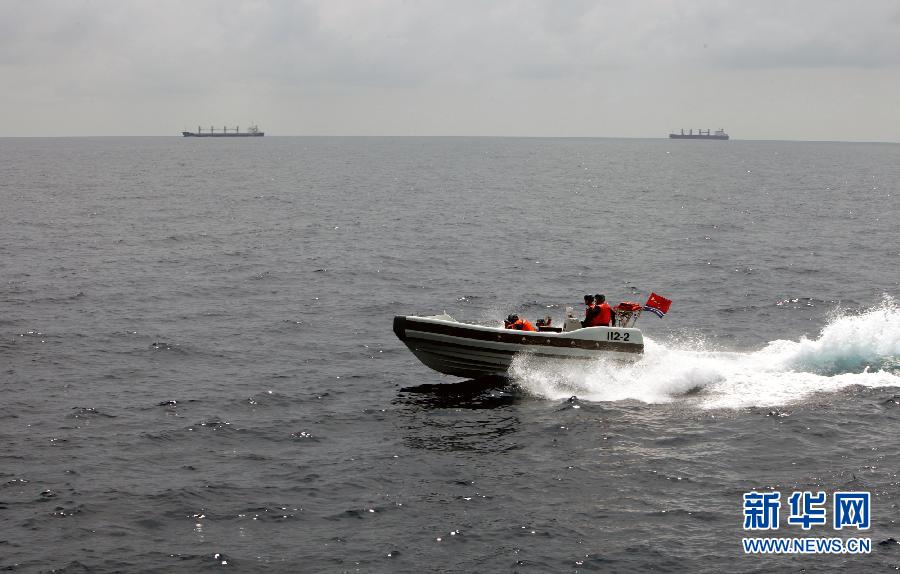 The 14th escort taskforce under the Navy of the Chinese People's Liberation Army (PLA) expels several suspected vessels. (Xinhua/Rao Rao)