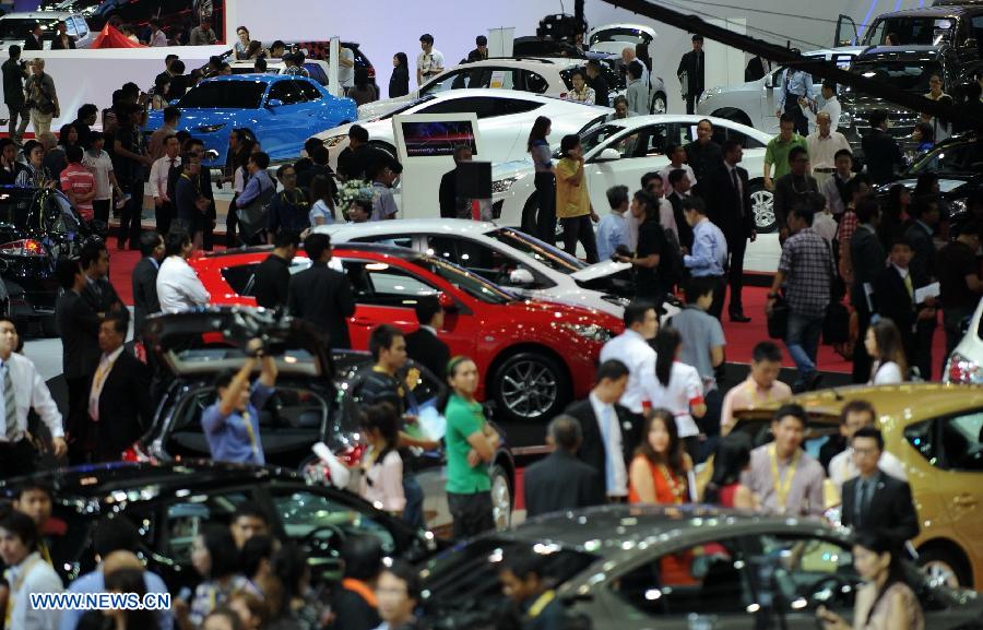 People visit the press preview of the 34th Bangkok International Motor Show in Bangkok, Thailand, on March 26, 2013. The 34th Bangkok International Motor Show will be held from March 27 to April 7. (Xinhua/Gao Jianjun) 
