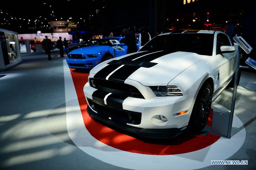 A Ford Mustang Shelby GT500 coupe is on display during press preview of the 2013 New York International Auto Show in New York, on March 27, 2013. The show features about 1,000 vehicles and will open to the public from March 29 to April 7. (Xinhua/Niu Xiaolei)  