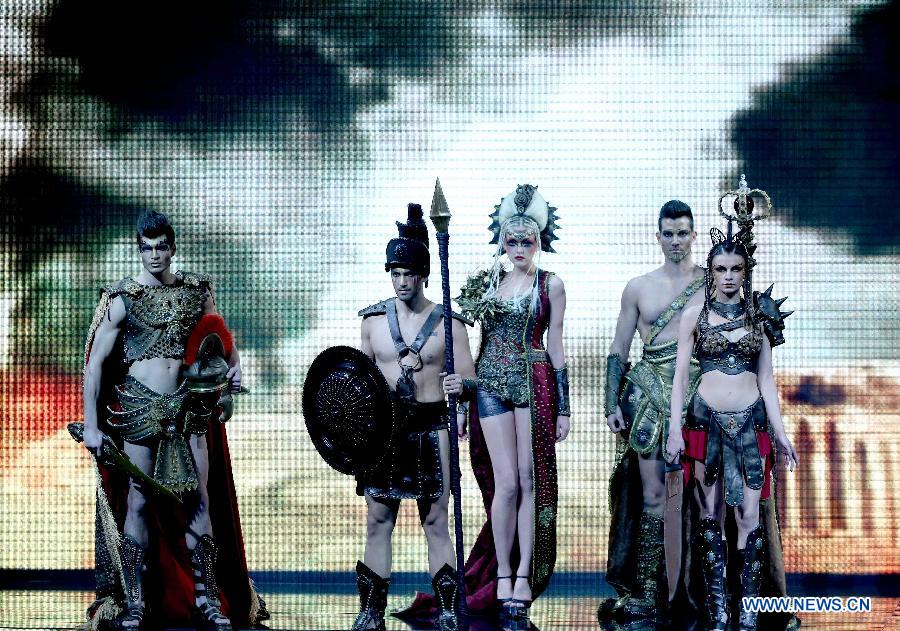 Models present creations during the MGPIN Collection at the China Fashion Week in Beijing, capital of China, March 27, 2013. (Xinhua/Chen Jianli) 