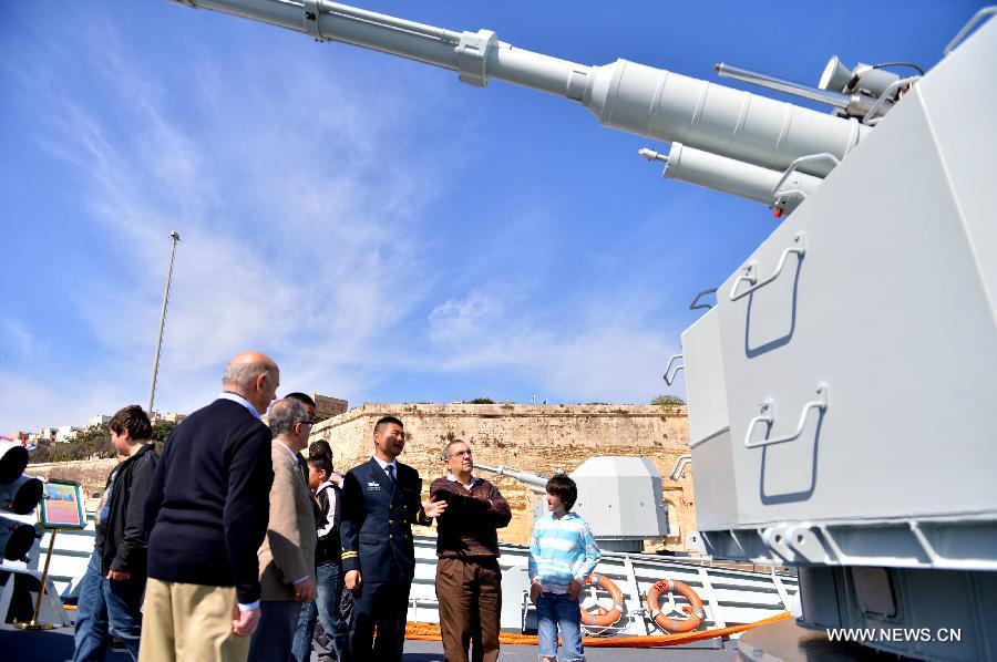 Local Maltese and tourists visit the Chinese frigate "Hengyang" at the grand habour of Valletta, Malta, on March 27, 2013. An Open Day of the "Hengyang" for Maltese was held on Wednesday. The 13th naval escort squad, sent by the Chinese People's Liberation Army (PLA) Navy, arrived at Valletta of Malta on Tuesday for a five-day visit after finishing its escort missions. (xinhua/Xu Nizhi)