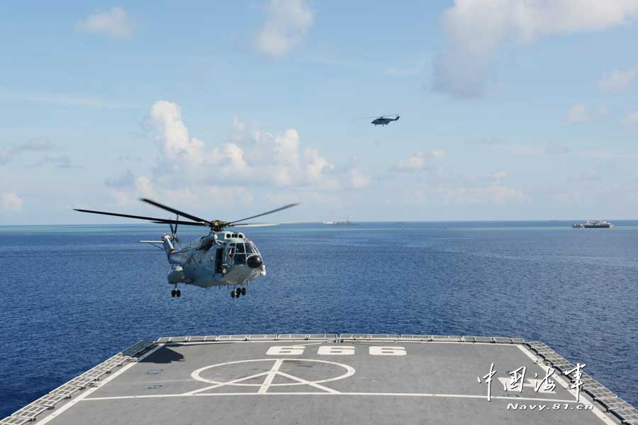 A joint maneuver taskforce under the South Sea Fleet of the Navy of the Chinese People’s Liberation Army (PLA) patrols the Meiji Reef, a fishing area and shelter for Chinese fishermen on March 27, 2013. (navy.81.cn/Qian Xiaohu, Song Xin) 