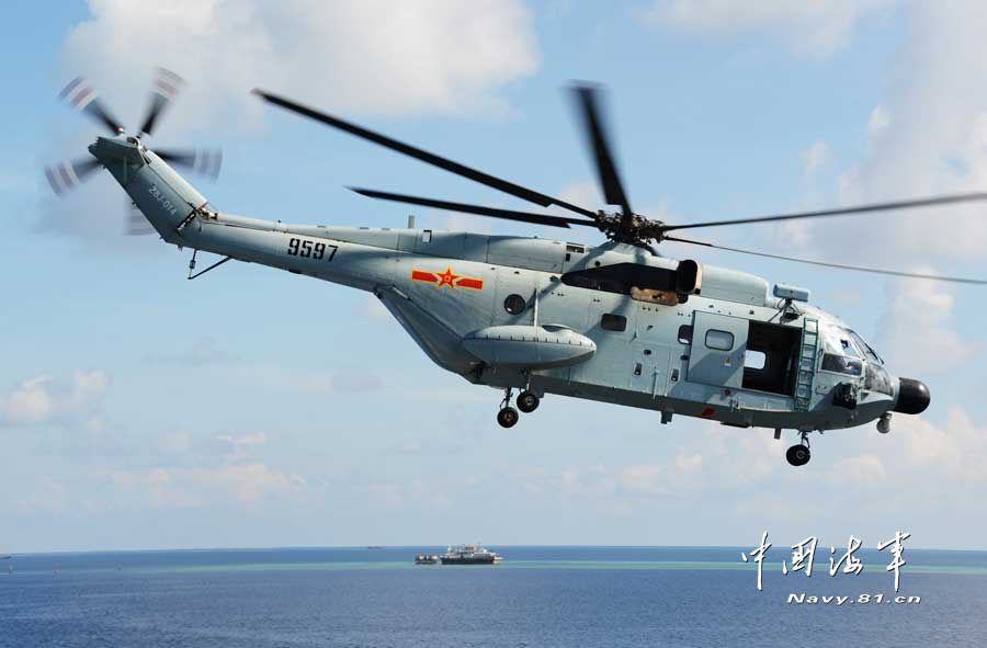 A joint maneuver taskforce under the South Sea Fleet of the Navy of the Chinese People’s Liberation Army (PLA) patrols the Meiji Reef, a fishing area and shelter for Chinese fishermen on March 27, 2013. (navy.81.cn/Qian Xiaohu, Song Xin) 