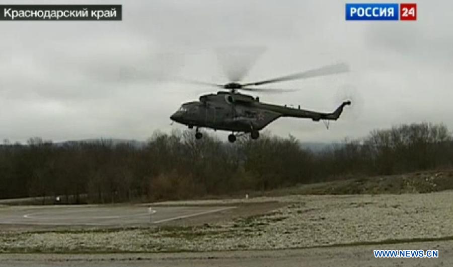 Video grab shows a military drill held in southern Russia, March 29, 2013. Russian President Vladimir Putin on Thursday ordered a sudden large-scale military drills in southern Russia, with the aim to test combat readiness of the troops. About 7,000 troops were put on alert without early warning, a press officer of the Russian Defense Ministry said. (Xinhua)