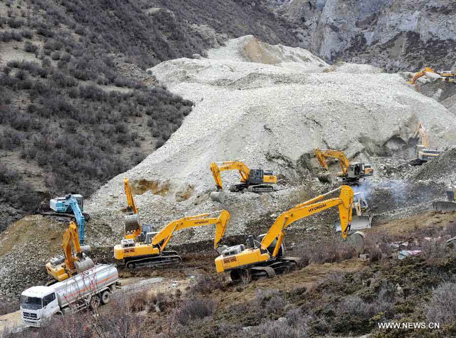 Photo taken on March 29, 2013 shows the site where a large-scale landslide hit a mining area in Maizhokunggar County of Lhasa, southwest China's Tibet Autonomous Region. Dozens of workers from a subsidiary of China National Gold Group Corporation were trapped. The exact number of trapped workers were not immediately known. (Xinhua/Chogo) 