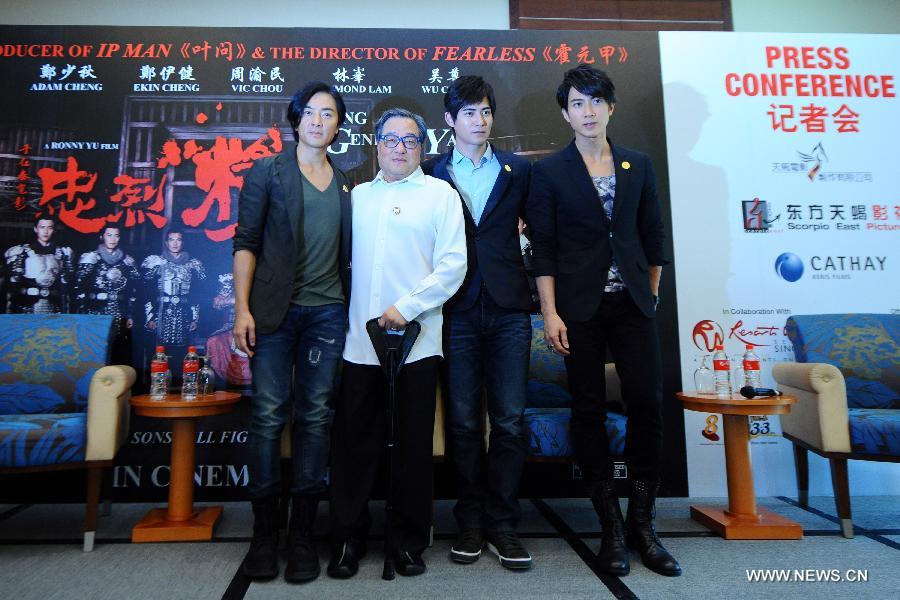 Director Ronny Yu (2nd L), actor Ekin Cheng (1st L), Vic Chou (2nd R) and Chun Wu attend the press conference for the movie "Saving General Yang" in Singapore's Sentosa, March 30, 2013. (Xinhua/Then Chih Wey)