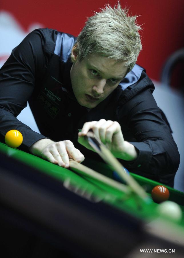 Neil Robertson of Australia competes during his final match against Mark Selby of England at the 2013 World Snooker China Open in Beijing, China, March 31, 2013. Robertson won 10-6 to claim the title. (Xinhua/Gong Lei)