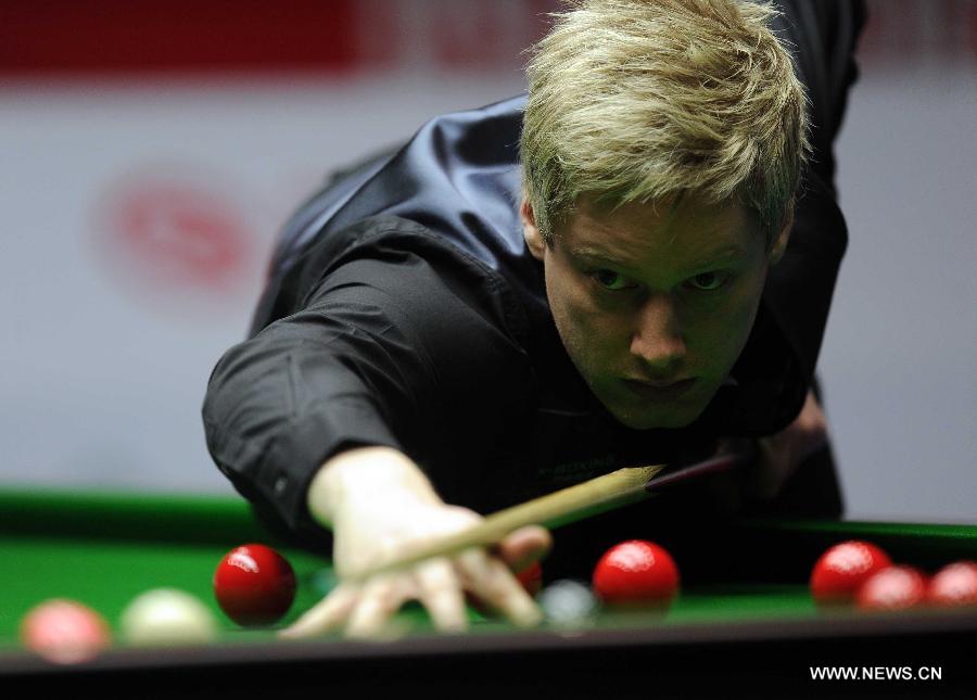 Neil Robertson of Australia competes during his final match against Mark Selby of England at the 2013 World Snooker China Open in Beijing, China, March 31, 2013. Robertson won 10-6 to claim the title. (Xinhua/Gong Lei)