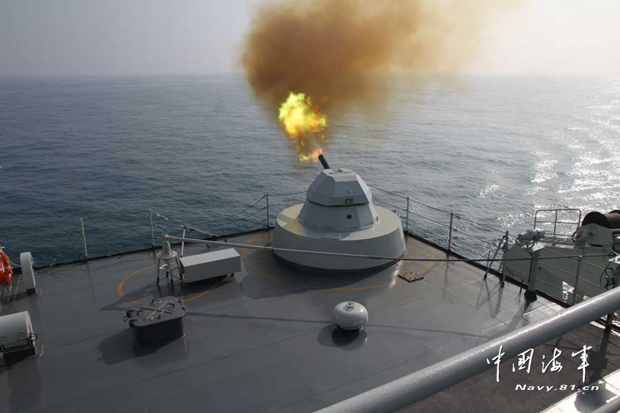 A warship of a joint maneuver taskforce under the South Sea Fleet of the Chinese People's Liberation Army (PLA) Navy conducts a live-ammunition fire drill in the west Pacific Ocean on March 31, 2013. (navy.81.cn/Qian Xiaohu, Song Xin, Gan Jun and Gao Yi)