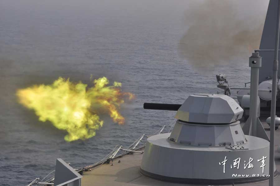 A warship of a joint maneuver taskforce under the South Sea Fleet of the Chinese People's Liberation Army (PLA) Navy conducts a live-ammunition fire drill in the west Pacific Ocean on March 31, 2013. (navy.81.cn/Qian Xiaohu, Song Xin, Gan Jun and Gao Yi)