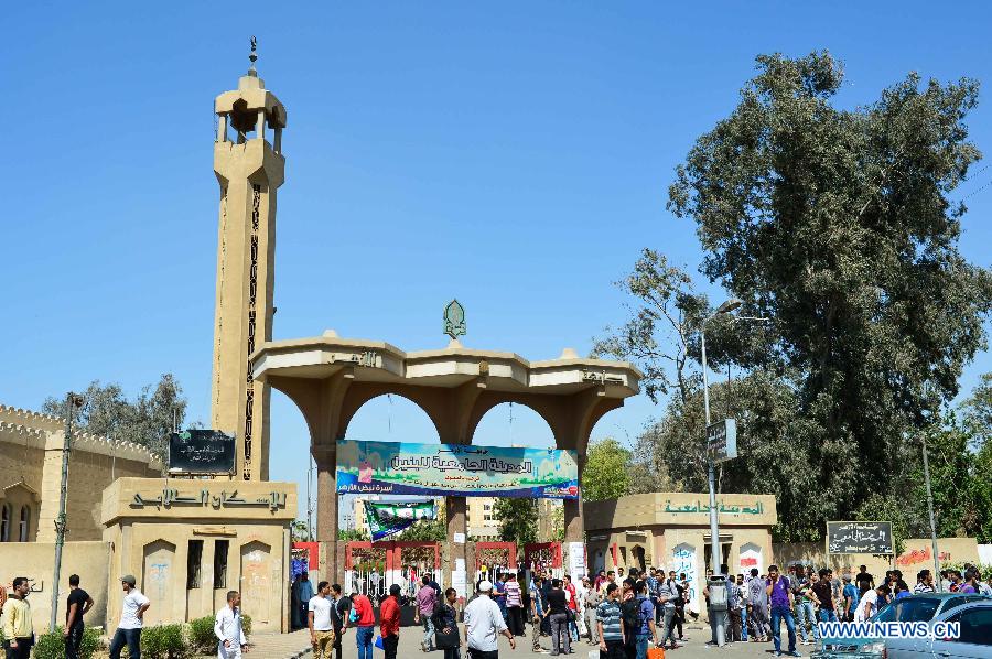 The photo taken on Apr. 2, 2013 shows the entrance of the dormitory area of al-Azhar University in Cairo, Egypt. As many as 561 Egyptian students of al-Azhar University have been infected with food poisoning on Apr, 1, with no deaths reported, spokesman for the Ministry of Health Yahia Moussa told Xinhua on Tuesday. (Xinhua/Qin Haishi) 