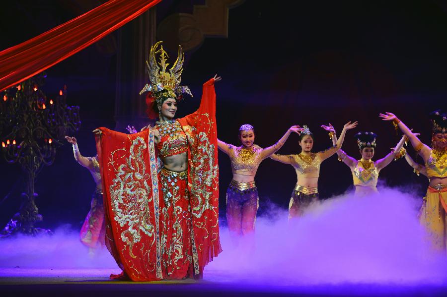 Members from the Guangzhou Acrobatics Troupe perform "Journey to the West" during the Fourth Lanzhou Art Festival in Lanzhou, capital of northwest China's Gansu Province, April 4, 2013. The performance retold the classic Chinese story of the same name. (Xinhua/Jia Xiaoyun)