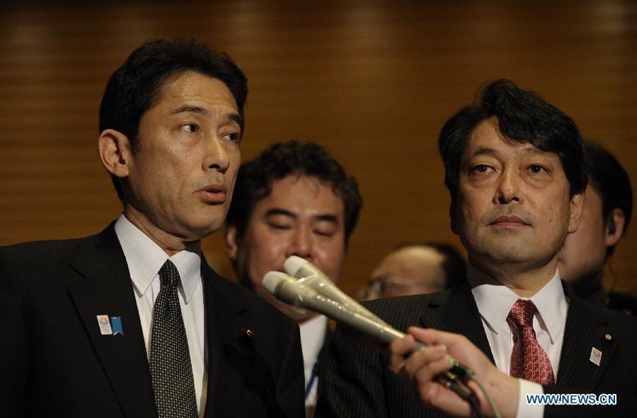 Japanese Foreign Minister Kishida Fumio (L) speaks to reporters at the prime minister's official residence in Tokyo, Japan, April 5, 2013. Japanese Prime Minister Shinzo Abe on Friday unveiled a Japan-U.S. time frame on returning Okinawa's land used by the U.S. military to the Japanese southernmost prefecture. (Xinhua/Kenichiro Seki)