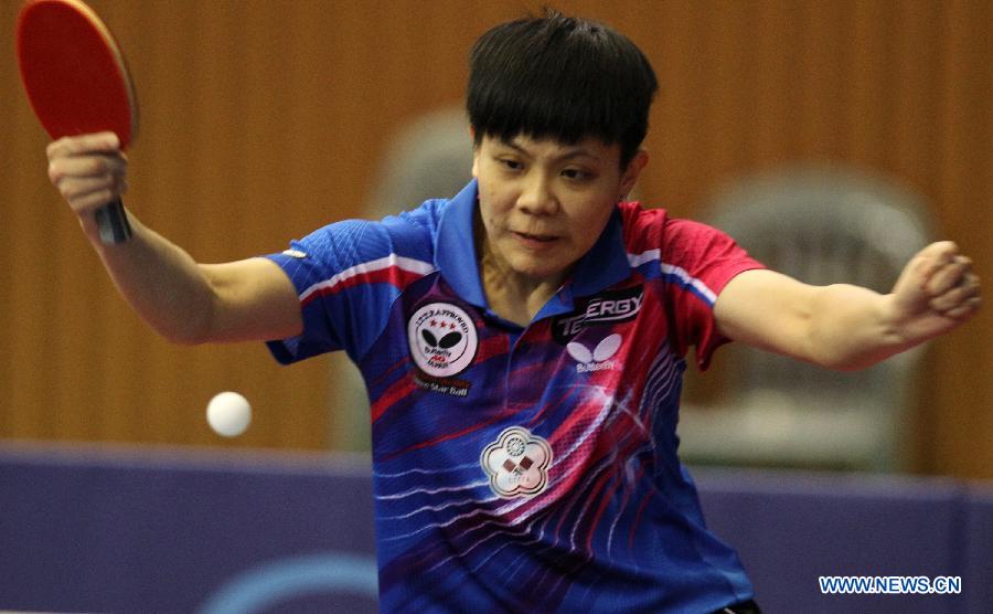 Cheng I-Ching of Chinese Taipei competes during the women's singles quarterfinal match against NG Wing Nam at the 2013 ITTF World Tour Korea Open U21 Events in Incheon, South Korea, April 6, 2013. Cheng I-Ching won 4-3. (Xinhua/Park Jin hee)