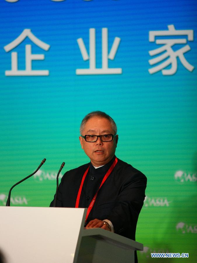 Chris Lu, CEO of Deloitte China, speaks prior to a round table meeting in Boao of south China's Hainan Province, April 6, 2013. A round table meeting of Boao Forum for Asia was held here for the leaders from private sector on April 6. (Xinhua/Xu Zijian) 