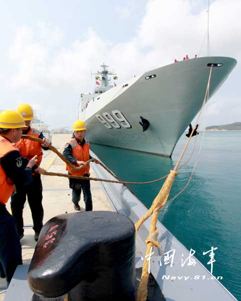 The joint mobile ship formation of the South China Sea Fleet under the Navy of the Chinese People's Liberation Army (PLA) officially returned to its home port at 09:00 on April 3, 2013. During the 16-day-long voyage, the joint mobile ship formation successively completed drills on 30-odd subjects such as defensive combat in naval mooring area, three-dimensional landing of the marine element, combined-arms assault on "enemy's" maritime mobile ship formation by various types of aircraft, maritime anti-terrorism and maritime search and rescue. The joint mobile ship formation sailed through the waters of the Xisha Islands, the Nansha Islands, the Zengmu Reef, the Bashi Channel and Western Pacific Ocean with a total navigation range of nearly 5,000 nautical miles. (China Military Online/Li Zhanglong)