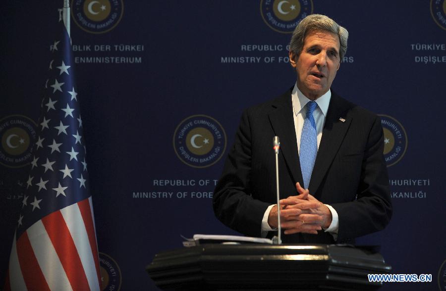 U.S. Secretary of State John Kerry attends a joint press conference with Turkish Foreign Minister Ahmet Davutoglu (not seen) after arriving at Istanbul, Turkey, April 7, 2013, as a part of his third trip to the Middle East in one month. Kerry will meet with Turkish Prime Minister Erdogan Sunday afternoon. (Xinhua/Lu Zhe) 