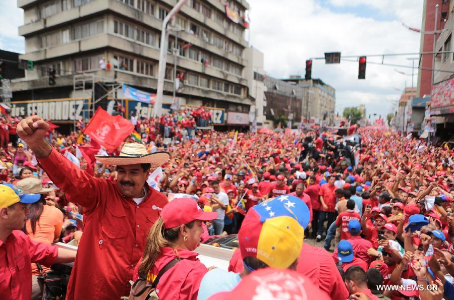 Image provided by Hugo Chavez Campaign Command shows Venezuelan Acting President and presidential candidate Nicolas Maduro attending a campaign in Maturin, Monagas State, Venezuela, on April 8, 2013. Venezuela will held presidential elections on April 14. (Xinhua/Hugo Chavez Campaign Command) 