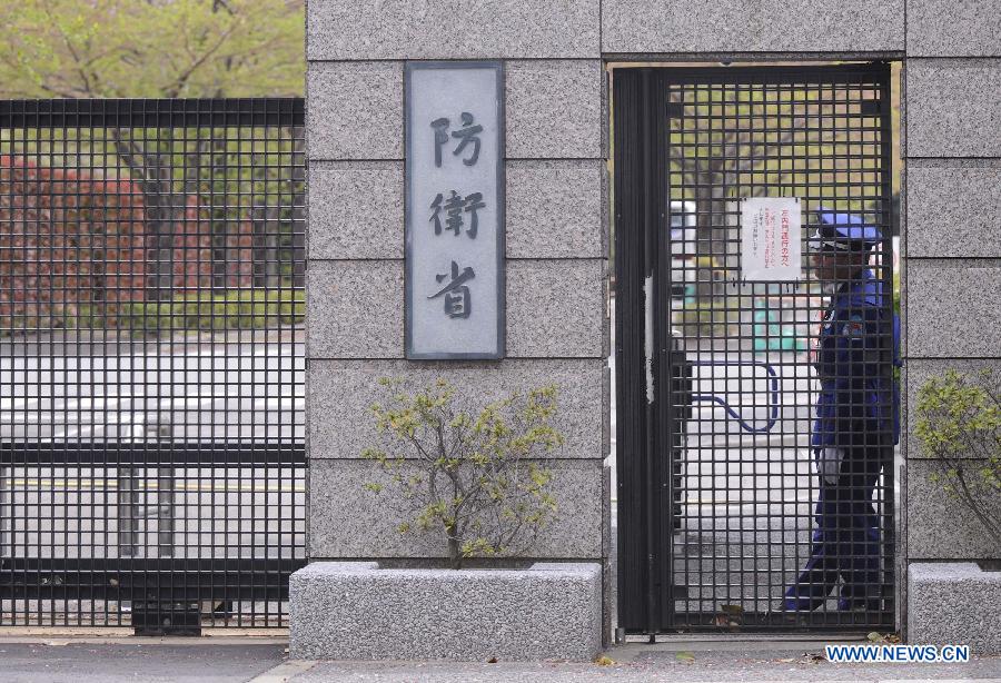 A staff memeber stands guard at the gate of the Defense Ministry in Tokyo, capital of Japan, April 9, 2013. Japan's Defense Ministry deployed Tuesday Patriot Advanced Capability-3 (PAC-3) missile interceptor in central Tokyo, in a move to prepare for the possible missile launch of the Democratic People's Republic of Korea. (Xinhua/Kenichiro Seki) 