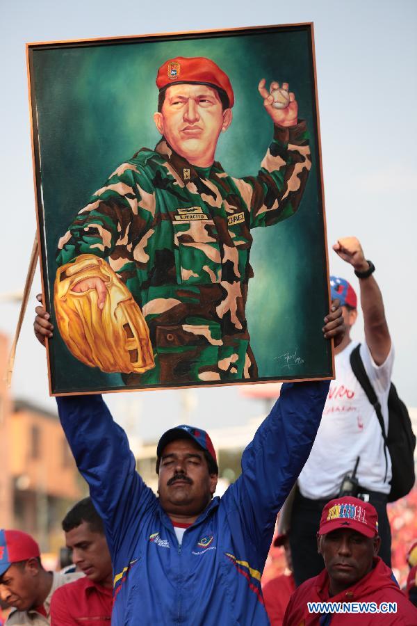 Image provided by Hugo Chavez Campaign Command shows Venezuelan Acting President and presidential candidate Nicolas Maduro attending a campaign rally in Vargas state, Venezuela, on April 9, 2013. Venezuela will hold presidential elections on April 14.(Xinhua/Hugo Chavez Campaign Command)