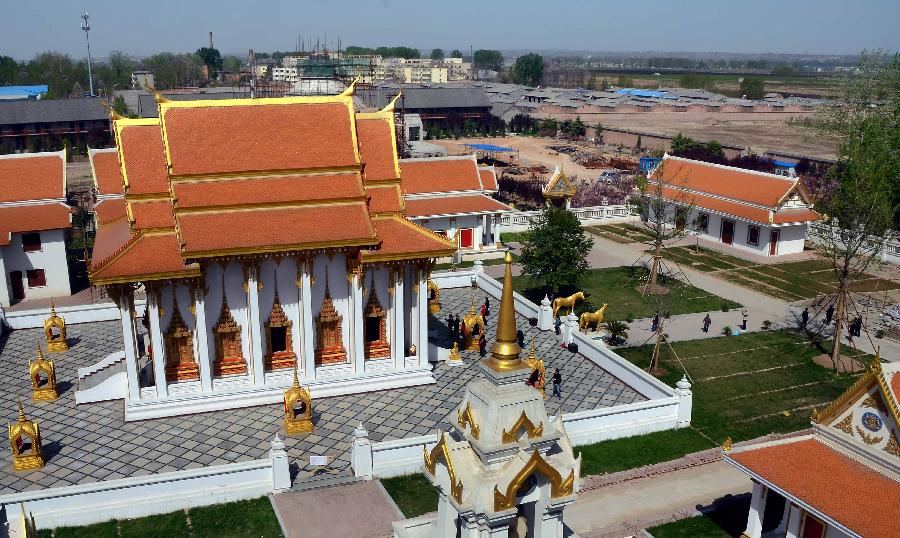 Photo taken on April 10, 2013 shows the Thai-style Buddha hall at the Baima Temple, or the White Horse Temple, in Luoyang City, Central China's Henan Province. Visitors can see Buddha halls with different styles of foreign countries at the Baima Temple, the oldest Buddhist temple in China.(Xinhua/Wang Song) 