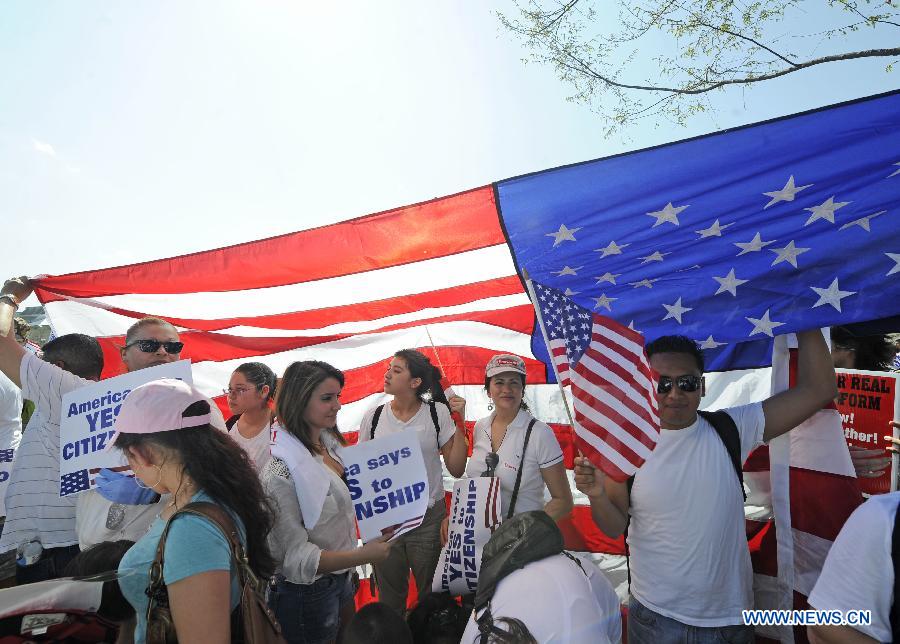 Immigration reform supporters demonstrate in the "Rally for Citizenship" on the West Lawn of Capitol Hill in Washington D.C., capital of the United States, April 10, 2013. Two senior U.S. Senators, Democratic Senator Charles Schumer and Republican Senator John McCain, who are working together to broker an immigration reform plan on Sunday, expressed optimism that a bill could be ready within this week. (Xinhua/Zhang Jun) 