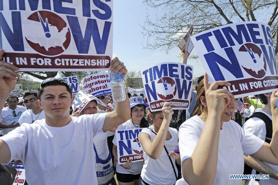 Immigration reform supporters demonstrate in the "Rally for Citizenship" on the West Lawn of Capitol Hill in Washington D.C., capital of the United States, April 10, 2013. Two senior U.S. Senators, Democratic Senator Charles Schumer and Republican Senator John McCain, who are working together to broker an immigration reform plan on Sunday, expressed optimism that a bill could be ready within this week. (Xinhua/Zhang Jun) 