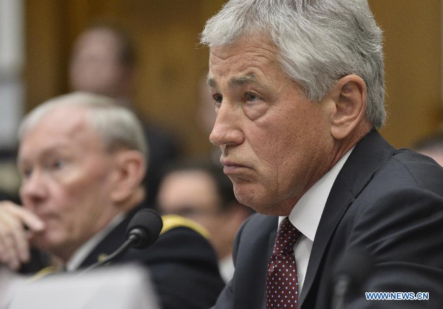 U.S. Secretary of Defense Chuck Hagel testifies before the House Armed Services Committee during a hearing on the fiscal year 2014 national defense authorization budget request from the Department of Defense, on Capitol Hill in Washington D.C., capital of the United States, April 11, 2013. U.S. President Barack Obama on Wednesday proposed a 526.6-billion-dollar base budget for the Defense Department in fiscal year 2014, as the Pentagon struggles to provide funds for its strategic rebalance to the Asia Pacific amid mandatory budget cuts. (Xinhua/Zhang Jun) 