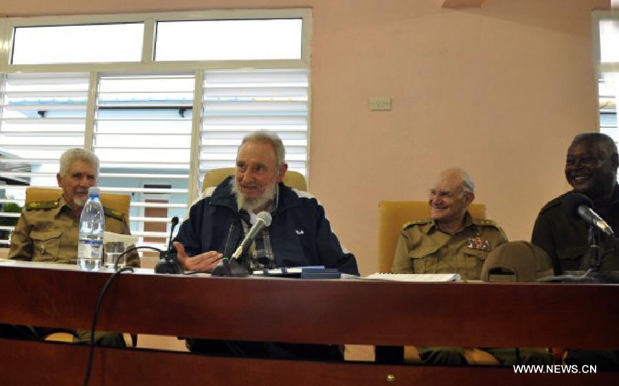 Image provided by Cubadebate on April 11, 2013 shows former Cuban president, Fidel Castro (2nd L), attending the opening of the Vilma Espin Guillois school, in Havana, capital of Cuba, on April 9, 2013. According to the official media, Castro talked for over two hours to students, teachers and other guests to the opening ceremony of the school, which was built thanks to the initiative of former president. (Xinhua/Cubadebate) 