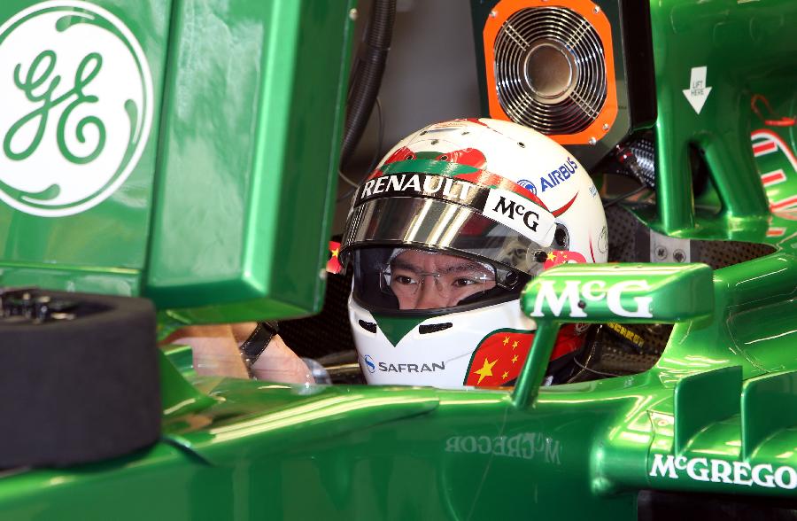 Caterham reserve driver Ma Qinghua drives during the first practice session of the Chinese F1 Grand Prix at the Shanghai International circuit, in Shanghai, east China, on April 12, 2013. (Xinhua/Fan Jun)