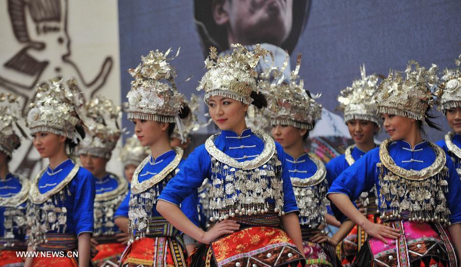 Models present costumes of the Miao ethnic group at the Guangxi Museum of Nationalities in Nanning, capital of south China's Guangxi Zhuang Autonomous Region, April 12, 2013. A total of 210 set of traditional costumes of the Miao ethnic group went on display here on Friday. Costumes of the Miao ethnic group is well known for its fine craftsmanship, brilliant colors, various styles and rich cultural connotations. (Xinhua/Lu Boan)