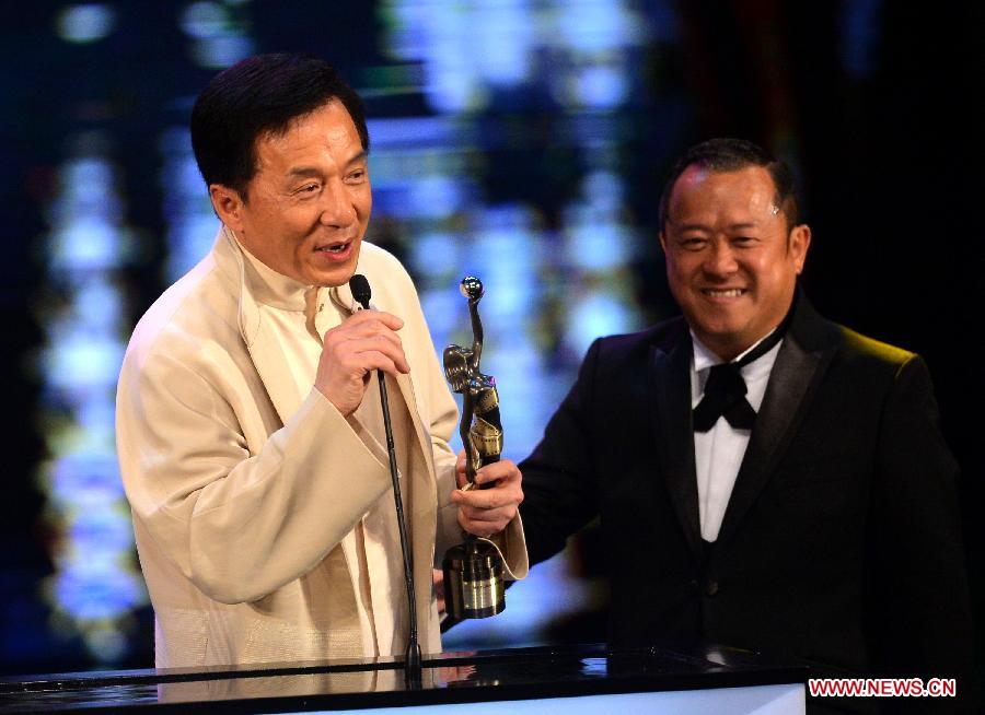 Actor Jackie Chan receivs the Best Action Choreography award for his movie "CZ 12" at the presentation ceremony of the 32nd Hong Kong Film Awards in south China's Hong Kong, April 13, 2013. (Xinhua/Chen Xiaowei)
