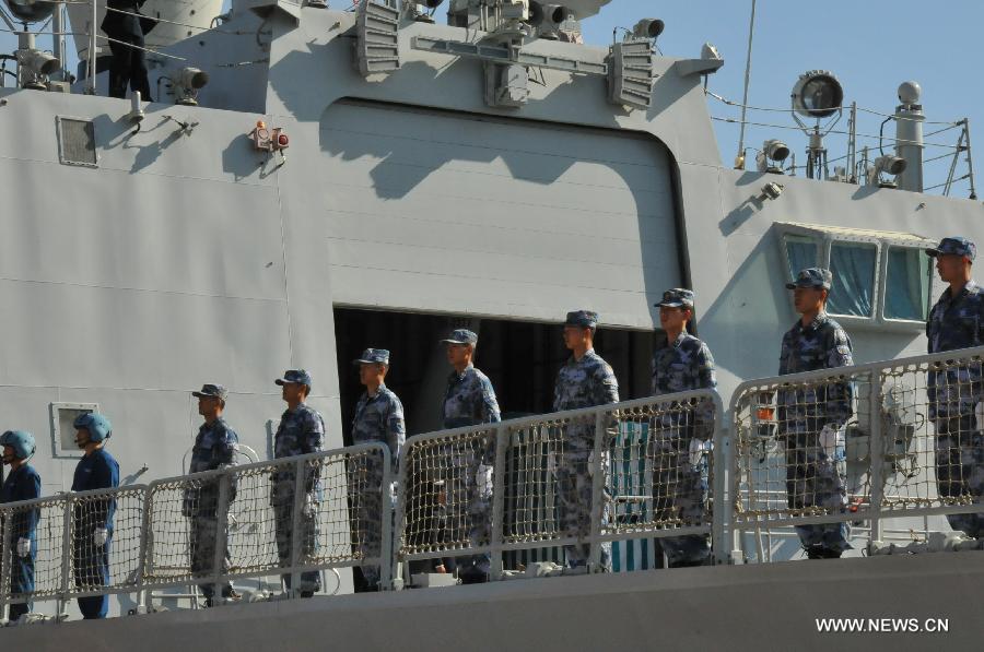 Chinese navy soldiers stand on the frigate Hengyang as the frigate leaves Casablanca, Moroco, April 13, 2013. The 13th Escort Taskforce of the Chinese navy on Saturday ended a five-day visit to Morocco. (Xinhua/Lin Feng)