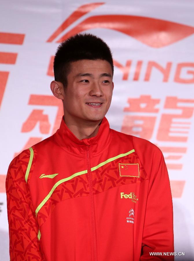 Badminton world champion Chen Long of China attends a brand promotion event in Taipei, southeast China's Taiwan, April 15, 2013, ahead of the Badminton Asia Championships which will be held in Taipei arena from April 16 to 21. (Xinhua/Xie Xiudong)