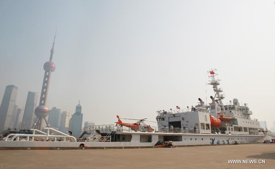 Patrol vessel Haixun01 is berthed at a port in Shanghai, east China, April 15, 2013. Haixun 01, soon to be put into service and managed by the Shanghai Maritime Bureau, is China's largest and most advanced patrol vessel. The 5,418-tonnage Haixun01 is 128.6 meters in length and has a maximum sailing distance of 10,000 nautical miles (18,520 km) without refueling. It will carry out missions regarding maritime inspection, safety monitoring, rescue and oil spill detection and handling. (Xinhua/Chen Fei) 