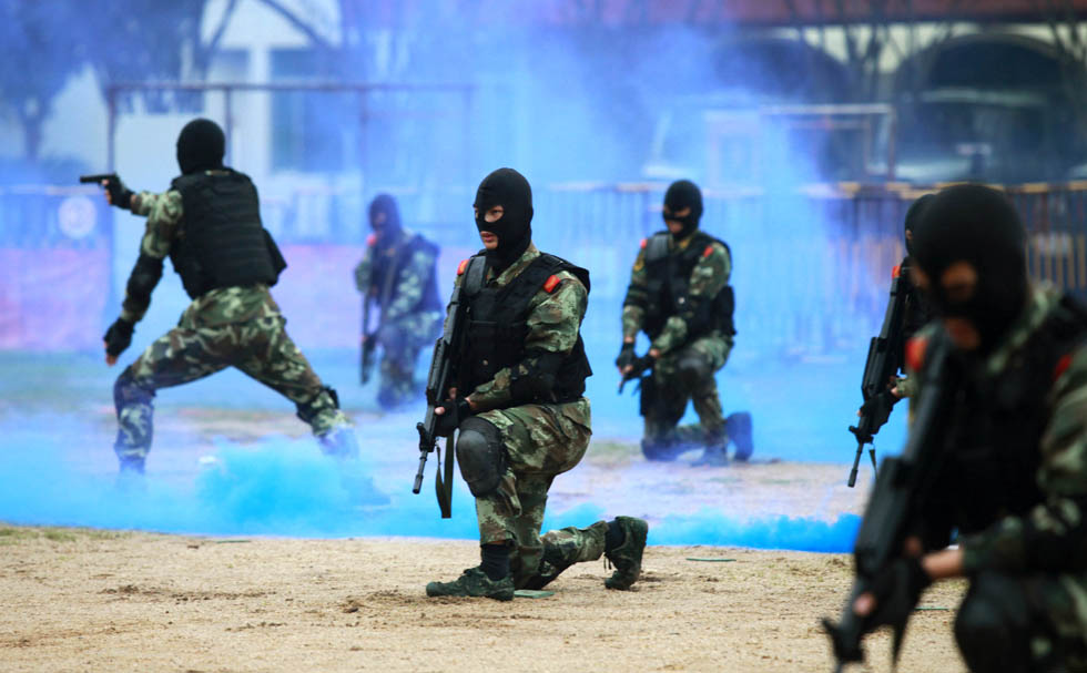 This is the site of the anti-terrorism tactical exercises conducted by No. 7 Special Firefighting and Rescue Detachment of Guangdong Armed Police Frontier Corps on April 9, 2013 (Photo by Tian Jianchuan/ Xinhua)