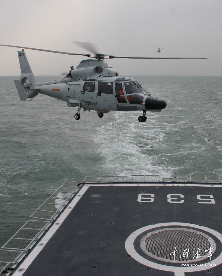 A warship formation of the East Sea Fleet under the Navy of the Chinese People's Liberation Army (PLA) conducted a high-intensity coordinated-drill on 10 training subjects, such as the warship-and-helicopter joint training, warship-and- submarine joint training. (navy.81.cn /Luo Shangguan)