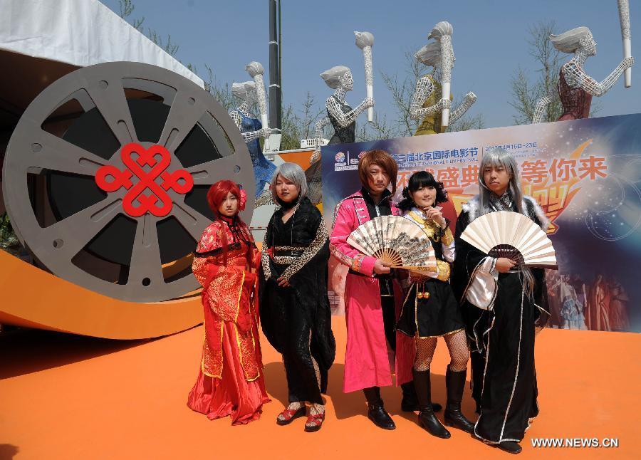 Cosplayers pose for a photo at the film carnival of the 3rd Beijing International Film Festival in Beijing, capital of China, April 16, 2013. The movie carnival kicked off here on Tuesday. (Xinhua/Luo Xiaoguang)