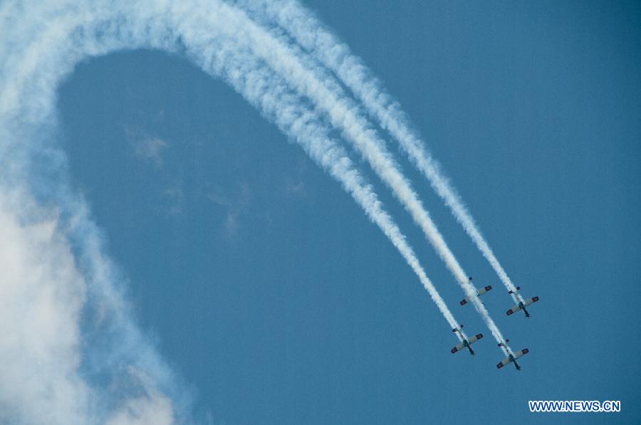 Israeli aircrafts perform aerobatic flights above the Mediterranean Sea near Tel Aviv during a celebration for Israel's Independence Day, April 16, 2013. Beginning at sundown Monday and ending at sundown on Tuesday, Israel celebrated its Independence Day marking the country's 65th anniversary. (Xinhua/Han Chong) 