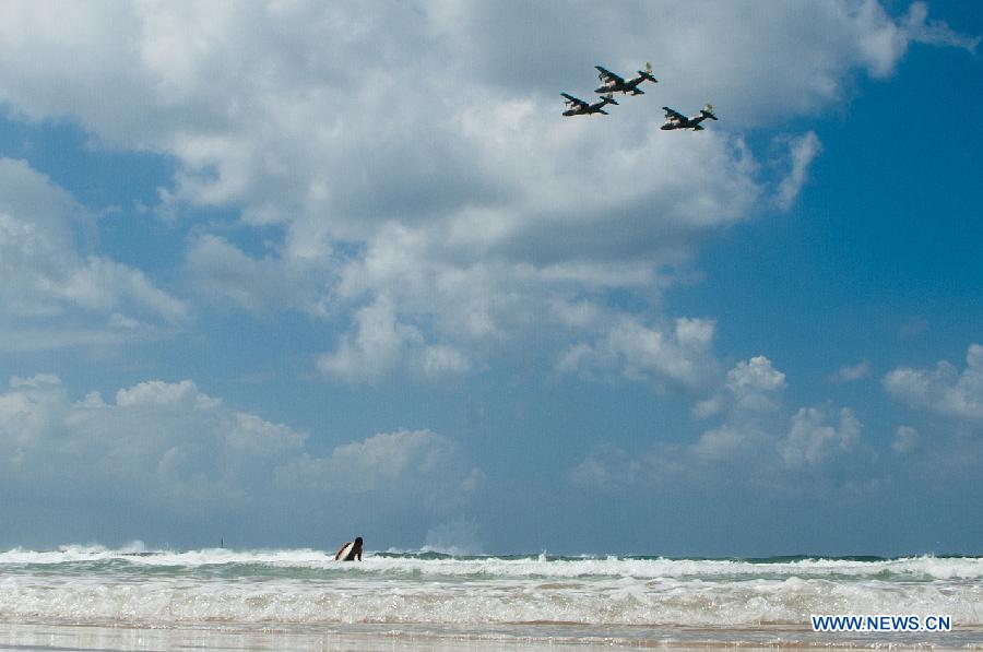 Israeli aircrafts perform aerobatic flights above the Mediterranean Sea near Tel Aviv during a celebration for Israel's Independence Day, April 16, 2013. Beginning at sundown Monday and ending at sundown on Tuesday, Israel celebrated its Independence Day marking the country's 65th anniversary. (Xinhua/Han Chong) 